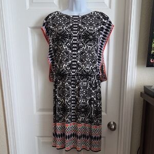 Black and White Patterned Dress with Pink Accents